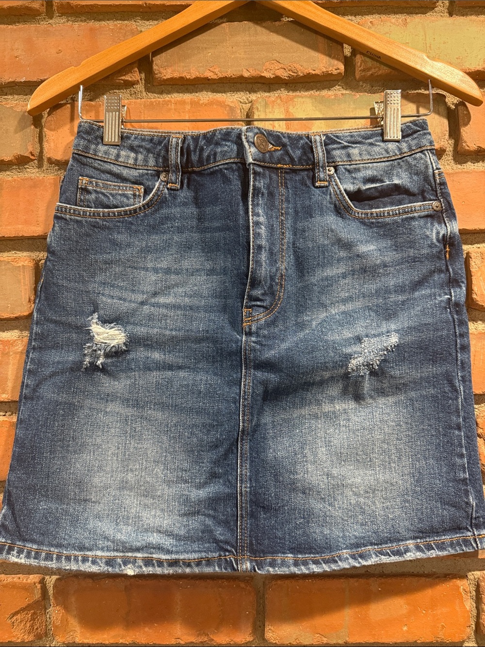 Classic Blue Denim Mini Skirt with Distressed Detail